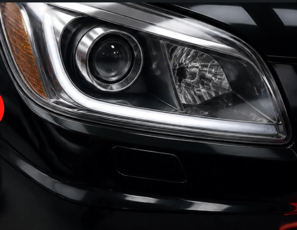 Clear restored vehicle headlight with a UV-protective finish