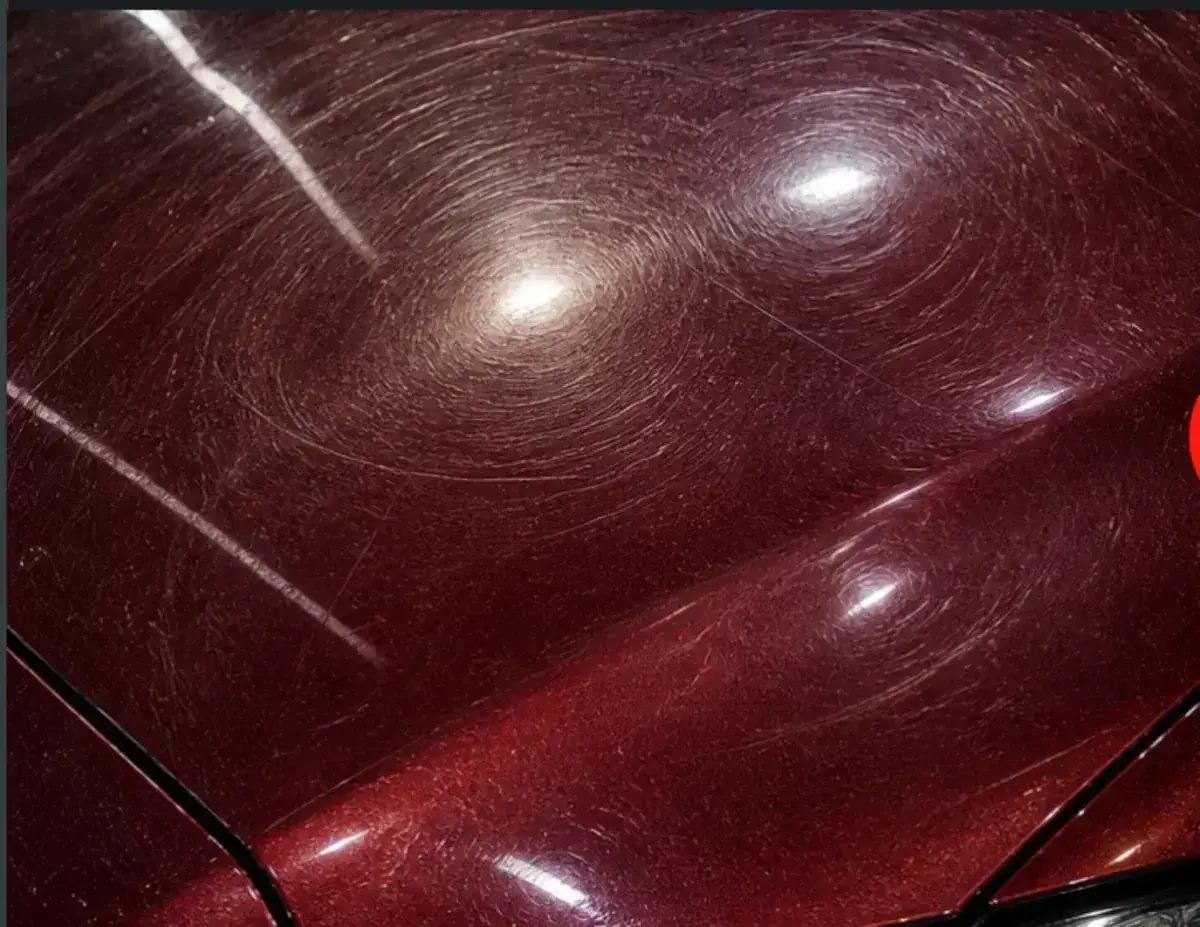 Vehicle paint showing visible scratches before targeted correction